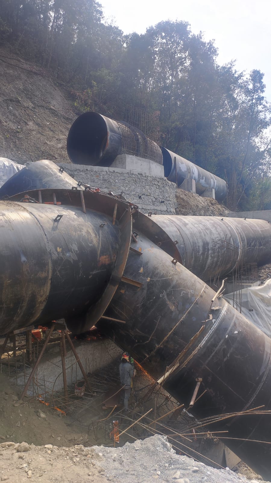 Penstock pipe junction at a construction site